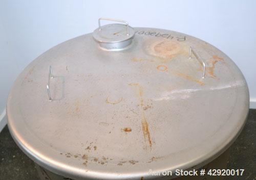 Used Tank, 110 Gallon, 304 Stainless Steel, Vertical. 30 Diameter x 36 straight side. Flat open top with a 1 piece cover, sloped bottom. Openings side 2 tri-clamp, 3 tri-clamp, 6 tri-clamp, 2 tri-cla...