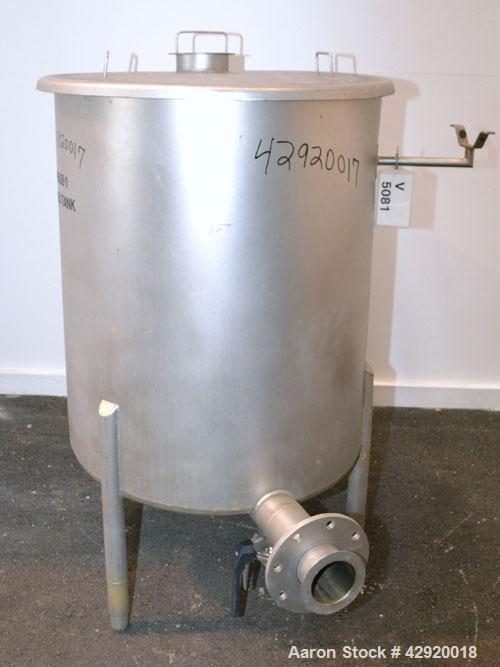 Used Tank, 110 Gallon, 304 Stainless Steel, Vertical. 30 Diameter x 36 straight side. Flat open top with a 1 piece cover, sloped bottom. Openings side 2 tri-clamp, 3 tri-clamp, 4 tri-clamp, 4 side bo...
