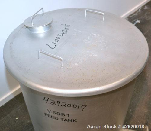 Used Tank, 110 Gallon, 304 Stainless Steel, Vertical. 30 Diameter x 36 straight side. Flat open top with a 1 piece cover, sloped bottom. Openings side 2 tri-clamp, 3 tri-clamp, 4 tri-clamp, 4 side bo...