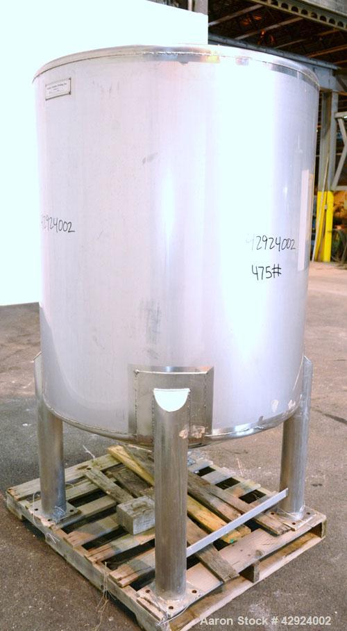 Used Sanitary Stainless Welding Tank, 325 Gallon, 304 Stainless Steel, Vertical. Approximate 44’’ diameter x 48’’ straight side. Flat top, coned bottom. Openings top (2) 1-1/2’’ tri-clamp, 15’’ man w...