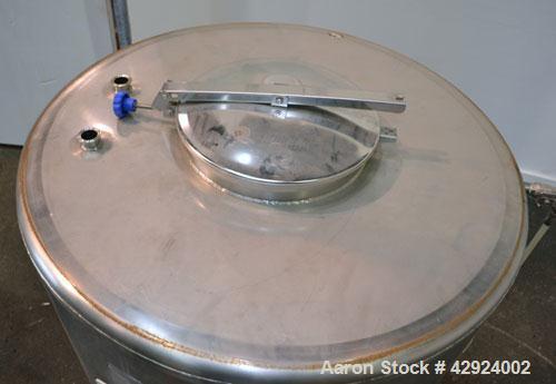 Used Sanitary Stainless Welding Tank, 325 Gallon, 304 Stainless Steel, Vertical. Approximate 44’’ diameter x 48’’ straight side. Flat top, coned bottom. Openings top (2) 1-1/2’’ tri-clamp, 15’’ man w...
