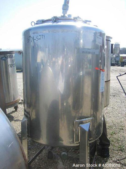 Used Tank, Approximate 160 Gallon, Electropolished Stainless Steel. 32" Diameter x 38" straight side. 18" Bolted top, 2" bottom outlet. Mounted on wheels.