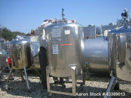 Used Tank, Approximate 110 Gallon, Electropolished Stainless Steel. 32" Diameter x 38" straight side. 18" Bolted top, 2" bottom outlet. Mounted on wheels.