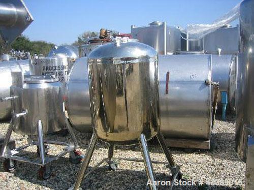 Used Tank, Approximately 50 Gallon, Electropolished Stainless Steel. 24" Diameter x 22" straight side. Dished heads. 1" Bottom outlet. Mounted on wheels.