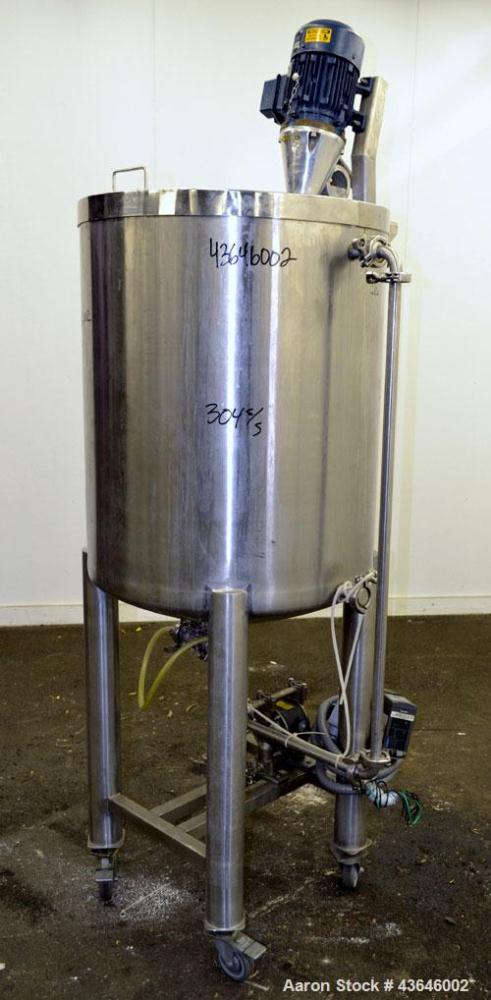 Used Tank, 90 Gallon, 304 Stainless Steel, Vertical. Approximate 28" diameter x 32" straight side. Flat top with a 1/2 hinged cover, dished bottom. Sidewall sight glass. Clamp on Agimex agitator, mod...