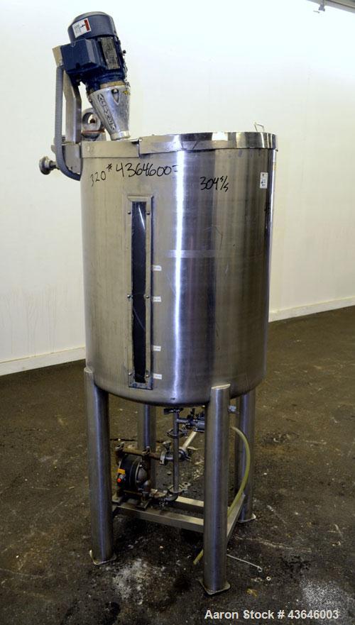 Used Tank, 90 Gallon, 304 Stainless Steel, Vertical. Approximate 28" diameter x 32" straight side. Flat top with a  hinged cover, dished bottom. Sidewall sight glass (has cracks). Clamp on Agimex agi...