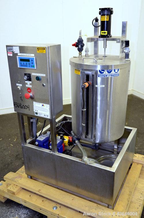 Used Tank, 25 Gallon, 304 Stainless Steel, Vertical. Approximate 18" diameter x 23" straight side. Flat top with a  hinged cover, coned bottom. Side sight glass. Off center top entering agitator. 1/4...