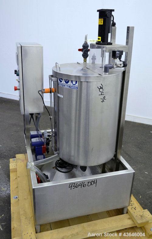 Used Tank, 25 Gallon, 304 Stainless Steel, Vertical. Approximate 18" diameter x 23" straight side. Flat top with a  hinged cover, coned bottom. Side sight glass. Off center top entering agitator. 1/4...