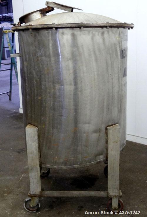Used Tank, 100 Gallon, 304 Stainless Steel, Vertical. 30" Diameter x 34" straight side. Dished bolt-on top with an 8" hand hole with cover, 2" sloped bottom. 2" Tri-clamp off center bottom outlet. Mo...