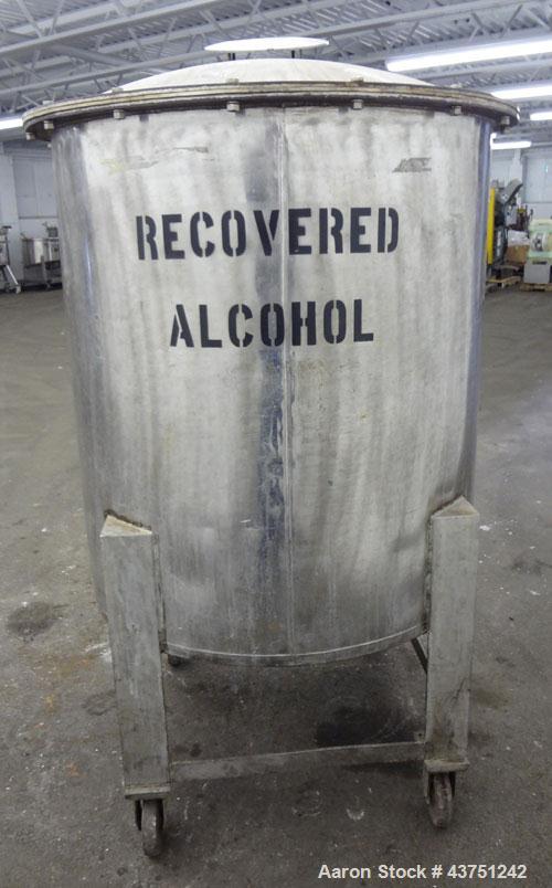 Used Tank, 100 Gallon, 304 Stainless Steel, Vertical. 30" Diameter x 34" straight side. Dished bolt-on top with an 8" hand hole with cover, 2" sloped bottom. 2" Tri-clamp off center bottom outlet. Mo...