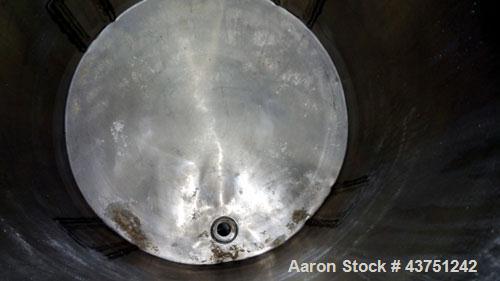 Used Tank, 100 Gallon, 304 Stainless Steel, Vertical. 30" Diameter x 34" straight side. Dished bolt-on top with an 8" hand hole with cover, 2" sloped bottom. 2" Tri-clamp off center bottom outlet. Mo...