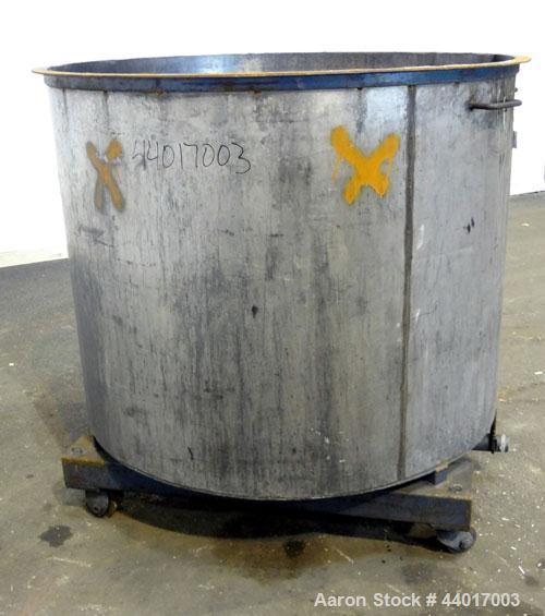 Used Tank, 400 Gallons, 301 Stainless Steel, Vertical. Approximate 54" diameter x 42" straight side, open top, no cover, slight coned bottom. 2" Center bottom outlet. Mounted on a carbon steel frame ...