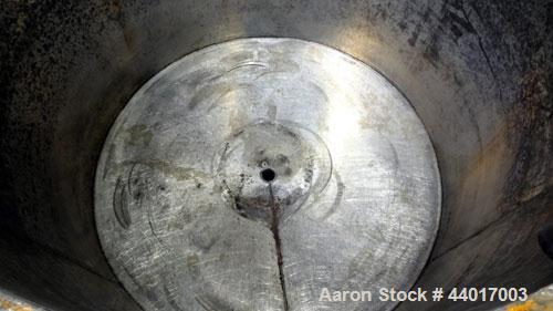 Used Tank, 400 Gallons, 301 Stainless Steel, Vertical. Approximate 54" diameter x 42" straight side, open top, no cover, slight coned bottom. 2" Center bottom outlet. Mounted on a carbon steel frame ...