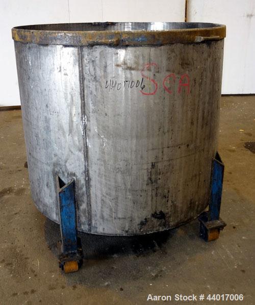 Used Tank, 300 Gallons, 301 Stainless Steel, Vertical. Approximate 48" diameter x 40" straight side, open top, no cover, coned bottom. 2" Center bottom outlet. Mounted on a carbon steel legs with cas...
