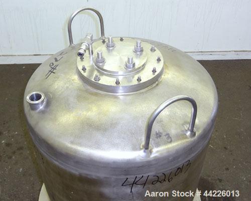 Used Tank, 50 Gallon (189 Liter), 316 Stainless Steel, Vertical. Approximate 24" diameter x 30" straight side, dished top and bottom. (3) Sidewall baffles. Openings top 1-1/2", 8". 2" Center bottom o...