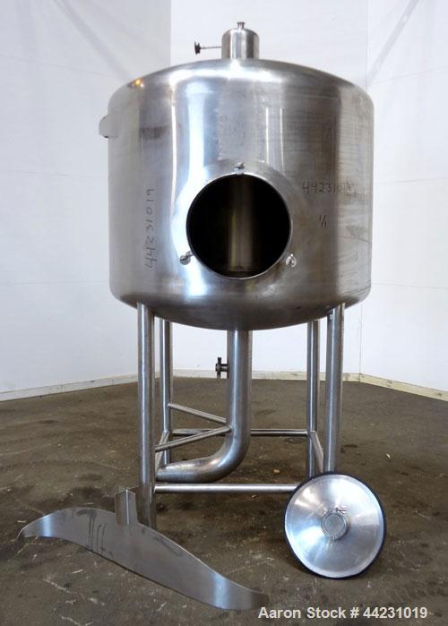 Used Tank, 450 Gallon, 304 Stainless Steel, Vertical. Approximate 60” diameter x 36” straight side, dished top and bottom. Top tangential inlet, top entering spray ball. Side 19” dameter man way with...