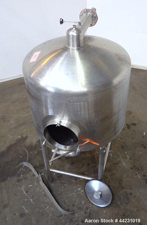 Used Tank, 450 Gallon, 304 Stainless Steel, Vertical. Approximate 60” diameter x 36” straight side, dished top and bottom. Top tangential inlet, top entering spray ball. Side 19” dameter man way with...
