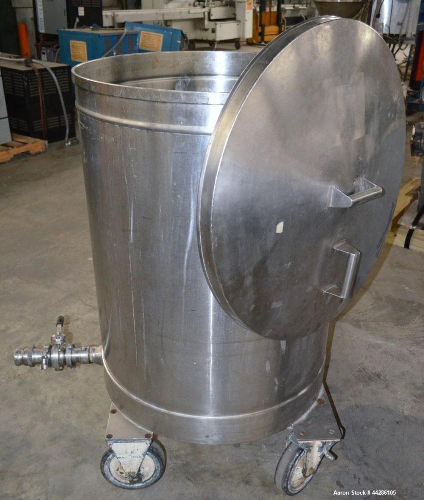Used Tank, 100 Gallon, 304 Stainless Steel, Vertical. Approximate 31" diameter x 38" straight side. Open top with a 1 piece cover, 1" sloped bottom. 2-1/4" Side bottom outlet. Skirt mounted with cast...