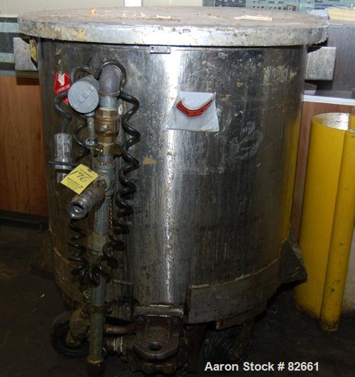 Used Tank, 300 Gallon, Stainless Steel, Vertical. 48" diameter x 48" straight side. Open top, sloped bottom. Approximately 3 hp rotary lobe pump mounted to bottom of tank. Tank Mounted on casters.