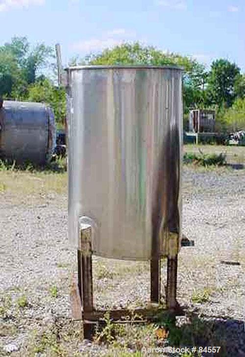 Used Tank, 50 Gallon, Stainless Steel, Vertical. 22" diameter x 34" straight side. Open top, sloped bottom. Mounted on four legs.