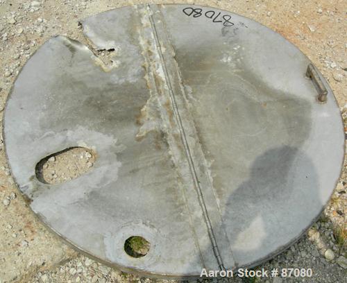 Used Tank, 225 gallon, 321 stainless steel, vertical. Approximate 36" diameter x 46" straight side. Flat top with a 1/2 hinged cover, coned bottom. Includes a JWI air operated clamp-on agitator, mode...