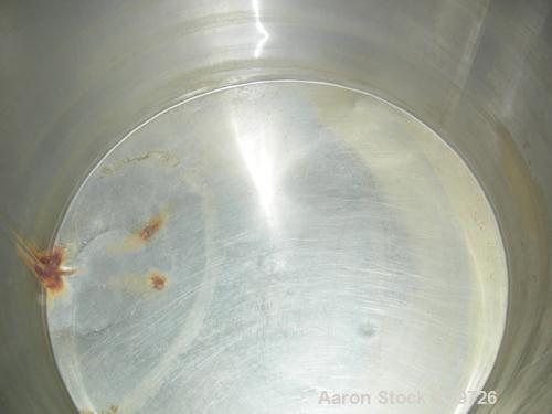 Used Tank, 340 Gallon, 304 Stainless Steel, Vertical. 48" diameter x 44" straight side, open top with a 2 piece cover, sloped bottom. Approximate 1" side bottom outlet. Mounted on 4 carbon steel legs...
