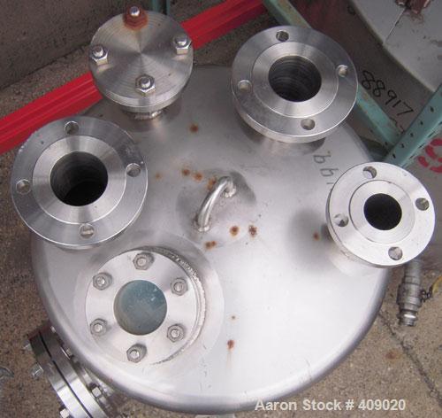 Used Northland Stainless Pressure Tank, 55 Gallon, 316L Stainless Steel, Vertical. 24" diameter x 26 1/2" straight side, dish top and bottom. Internal rated 100/fv at 150 deg F. Openings: top (2) 2",...