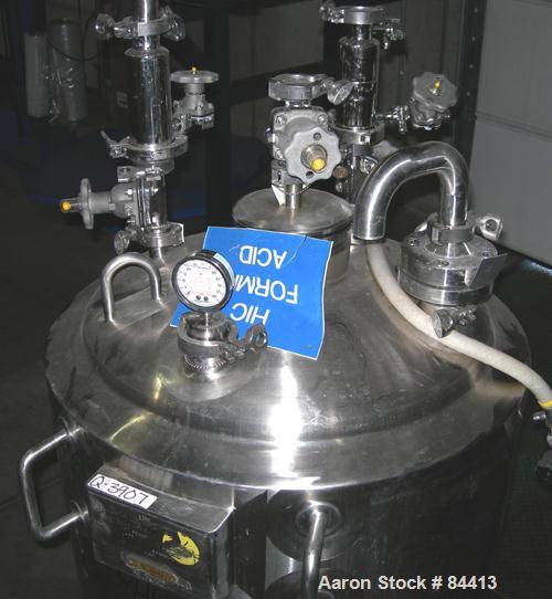 USED: Northland Stainless pressure tank, 60 gallon, 316 stainless steel, polished internal. 24" diameter x 32" straight side, dished top and bottom. Internal rated FV/50 psi at 400 deg F. (1) Spray b...