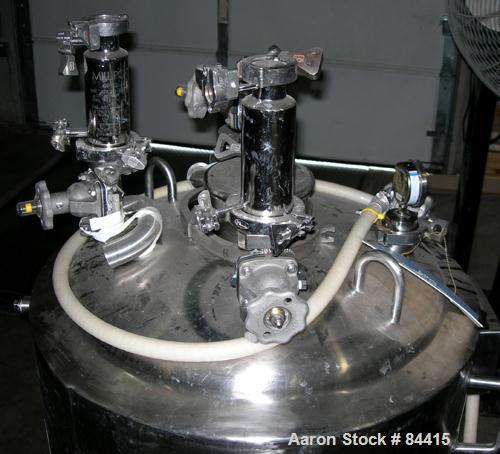 USED: Northland Stainless pressure tank, 60 gallon, 316 stainless steel, polished internal. 24" diameter x 32" straight side, dished top and bottom. Internal rated FV/50 psi at 400 deg F. (1) Spray b...