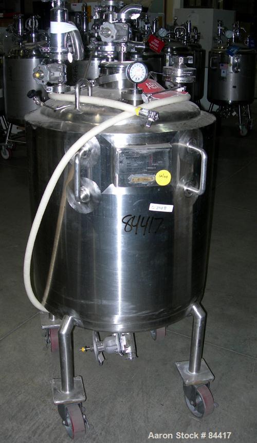 USED: Northland Stainless pressure tank, 60 gallon, 316 stainless steel, polished internal. 24" diameter x 32" straight side, dished top and bottom. Internal rated FV/50 psi at 400 deg F. (1) Spray b...