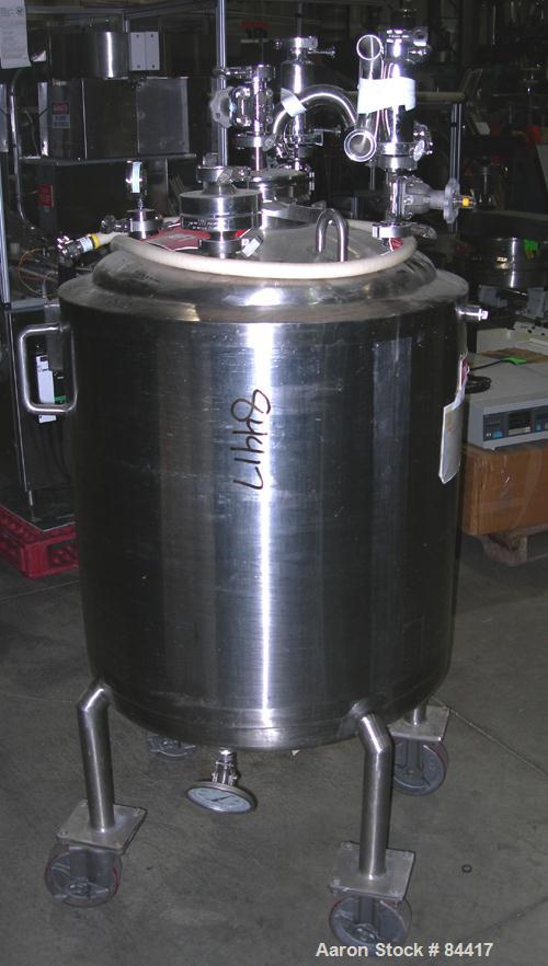 USED: Northland Stainless pressure tank, 60 gallon, 316 stainless steel, polished internal. 24" diameter x 32" straight side, dished top and bottom. Internal rated FV/50 psi at 400 deg F. (1) Spray b...