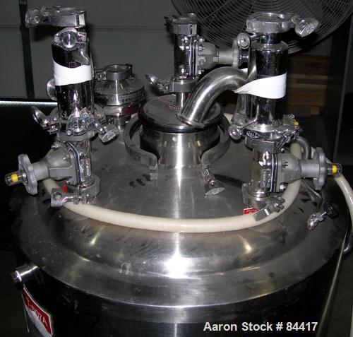 USED: Northland Stainless pressure tank, 60 gallon, 316 stainless steel, polished internal. 24" diameter x 32" straight side, dished top and bottom. Internal rated FV/50 psi at 400 deg F. (1) Spray b...