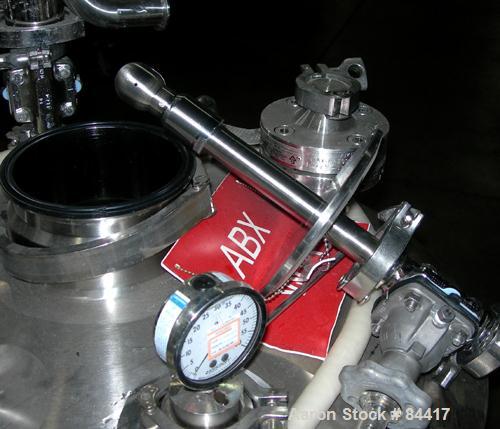 USED: Northland Stainless pressure tank, 60 gallon, 316 stainless steel, polished internal. 24" diameter x 32" straight side, dished top and bottom. Internal rated FV/50 psi at 400 deg F. (1) Spray b...