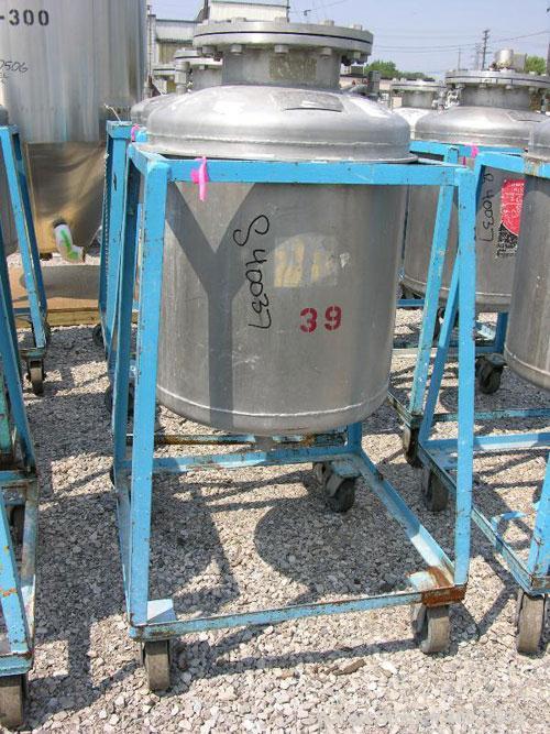 Used Norwalk Pressure Tank, 50 Gallon, Stainless Steel, Vertical. Approximately 24'' diameter x 24'' straight side, dished top and bottom. Internal rated 50 psi at 300 deg F. Top manway, center botto...