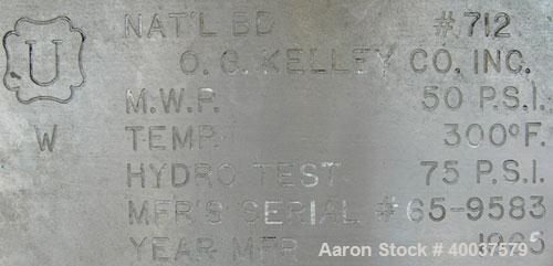 Used O.G. Kelley Co. Pressure Tank, 55 gallon, 304 stainless steel, vertical. 24'' diameter x 27'' straight side, dished top and bottom. Internal rated 50 psi at 300 deg F. Openings: top 10'' with co...