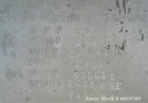 Used O.G. Kelley Co. Pressure Tank, 55 gallon, 304 stainless steel, vertical. 24'' diameter x 27'' straight side, dished top and bottom. Internal rated 50 psi at 300 deg F. Openings: top 10'' with co...