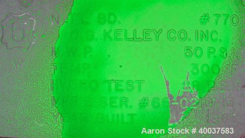 Used O.G. Kelley Co. Pressure Tank, 55 gallon, 304 stainless steel, vertical. 24'' diameter x 27'' straight side, dished top and bottom. Internal rated 50 psi at 300 deg F. Openings: top 10'' with co...