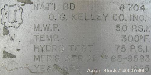 Used O.G. Kelley Co. Pressure Tank, 55 gallon, 304 stainless steel, vertical. 24'' diameter x 27'' straight side, dished top and bottom. Internal rated 50 psi at 300 deg F. Openings: top 10'' with co...