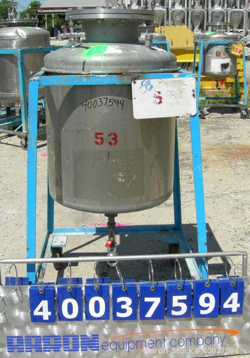 Used O.G. Kelley Co. Pressure Tank, 55 gallon, 304 stainless steel, vertical. 24'' diameter x 27'' straight side, dished top and bottom. Internal rated 50 psi at 300 deg F. Openings: top 10'' with co...