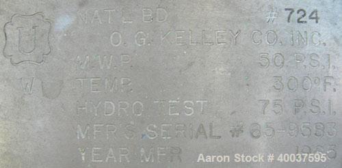Used O.G. Kelley Co. Pressure Tank, 55 gallon, 304 stainless steel, vertical. 24'' diameter x 27'' straight side, dished top and bottom. Internal rated 50 psi at 300 deg F. Openings: top 10'' with co...