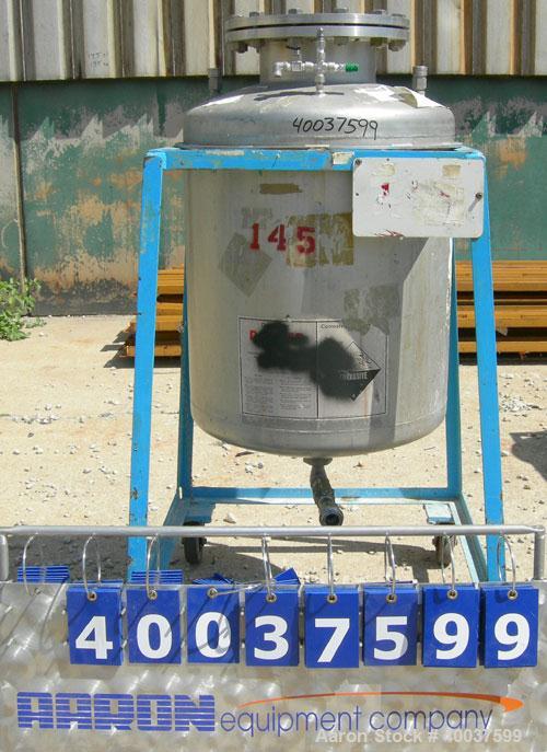 Used O.G. Kelley Co. Pressure Tank, 55 gallon, 304 stainless steel, vertical. 24'' diameter x 27'' straight side, dished top and bottom. Internal rated 50 psi at 300 deg F. Openings: top 10'' with co...