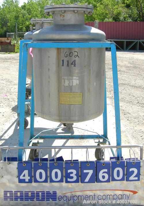 Used O.G. Kelley Co. Pressure Tank, 55 gallon, 304 stainless steel, vertical. 24'' diameter x 27'' straight side, dished top and bottom. Internal rated 50 psi at 300 degrees F. Openings: top 10'' wit...