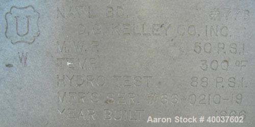 Used O.G. Kelley Co. Pressure Tank, 55 gallon, 304 stainless steel, vertical. 24'' diameter x 27'' straight side, dished top and bottom. Internal rated 50 psi at 300 degrees F. Openings: top 10'' wit...