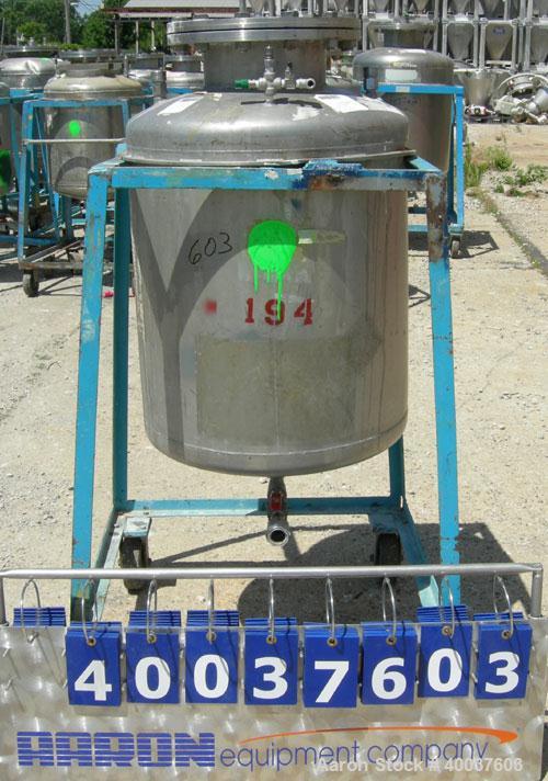 Used O.G. Kelley Co. Pressure Tank, 55 gallon, 304 stainless steel, vertical. 24'' diameter x 27'' straight side, dished top and bottom. Internal rated 50 psi at 300 deg F. Openings: top 10'' with co...