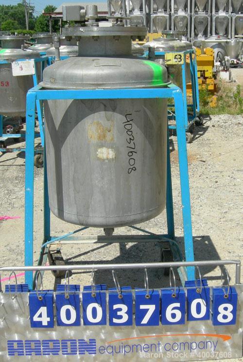 Used O.G. Kelley Co. Pressure Tank, 55 gallon, 304 stainless steel, vertical. 24'' diameter x 27'' straight side, dished top and bottom. Internal rated 50 psi at 300 deg F. Openings: top 10'' with co...