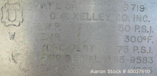 Used O.G. Kelley Co. Pressure Tank, 55 gallon, 304 stainless steel, vertical. 24'' diameter x 27'' straight side, dished top and bottom. Internal rated 50 psi at 300 deg F. Openings: top 10'' with co...
