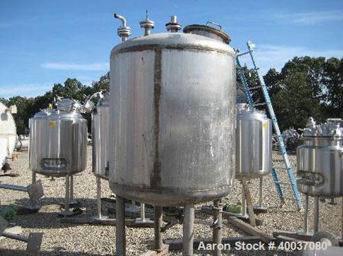 Used P.X. Engineering Pressure Tank, 400 Gallon, 304 Stainless Steel, Vertical. 48'' diameter x 48'' straight side, dished top and bottom. Internal rated 15 psi at 200 deg F. Openings: top 3", 1", 18...