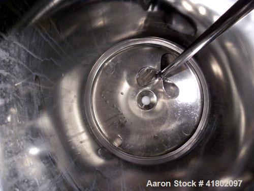 Used Packo Inox Pressure Tank, 52.8 gallon (200 liter), 316 stainless steel, vertical. Approximate 20’’ diameter x 34’’ straight side. Flat bolt on top, dished bottom. Internal rated –14.5 psi/50 psi...