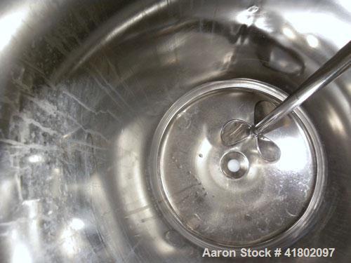 Used Packo Inox Pressure Tank, 52.8 gallon (200 liter), 316 stainless steel, vertical. Approximate 20’’ diameter x 34’’ straight side. Flat bolt on top, dished bottom. Internal rated –14.5 psi/50 psi...