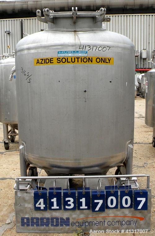Used Mueller Tank, 275 Gallon, Model F, 316 Stainless Steel, Vertical. 46’’ diameter x 36’’ straight side, dish top and bottom. Internal rated to 15 psi. Openings: top (2) 2’’ NPT, 18’’ manway, no co...